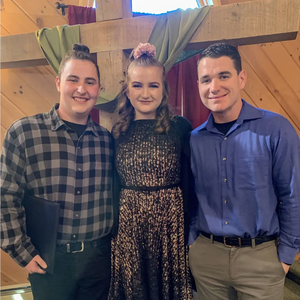 Jacob (left), Becky (middle), Joseph (right) celebrating their graduation from the Resident program
