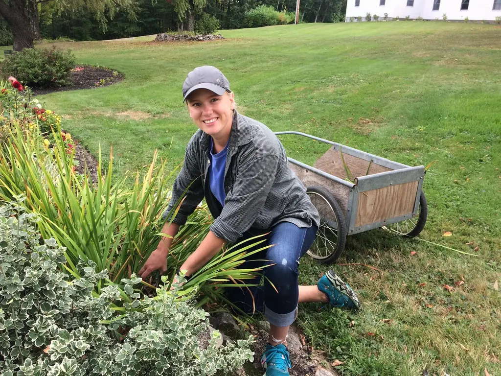 Sara as a Servant Leader, working in the flower garden