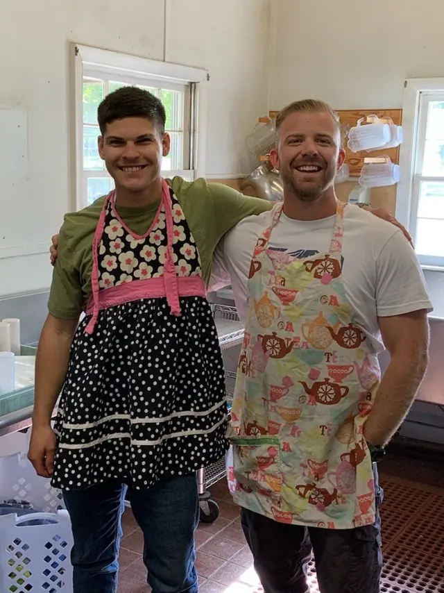 Josiah (right) and Kessler, another Servant Leader, helping out in the kitchen