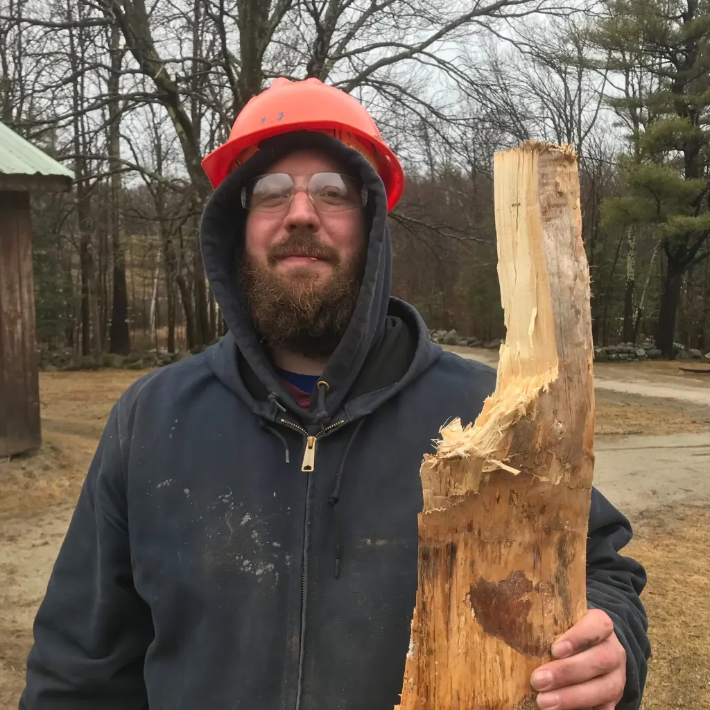 Dave splitting wood on work crew (2019).