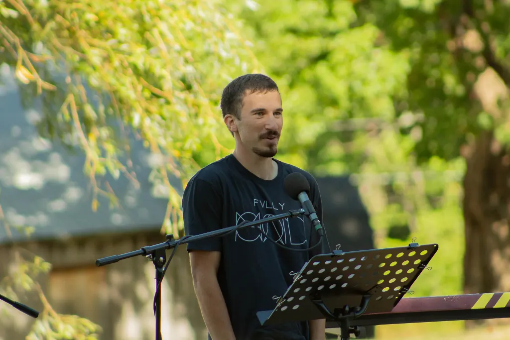 Robert giving his testimony at graduation in September (2020)