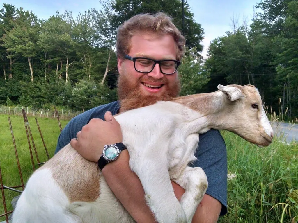 Dan working on the farm during his time as a Servant Leader