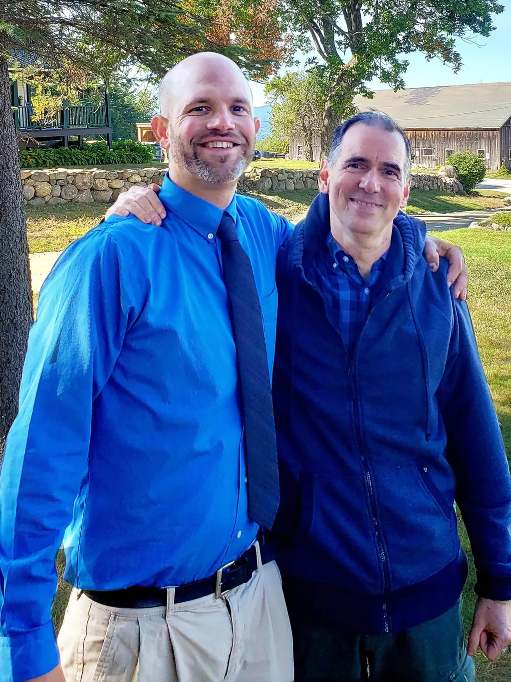 Will (right) and a Resident graduate celebrating Graduation Day