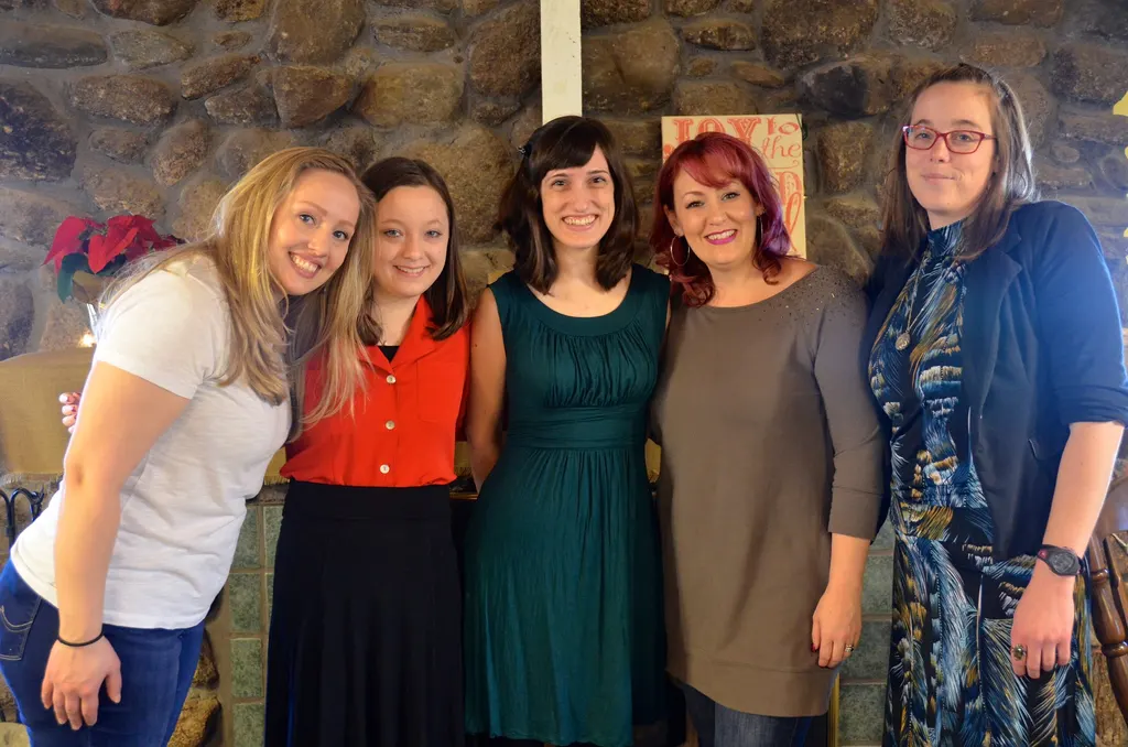 Alaine (left) and a few other ladies celebrating Thanksgiving at Griggs Dining Hall
